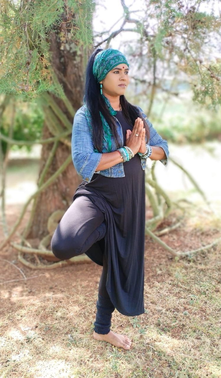Full length portrait of Ramashna Naidoo, yoga teacher
